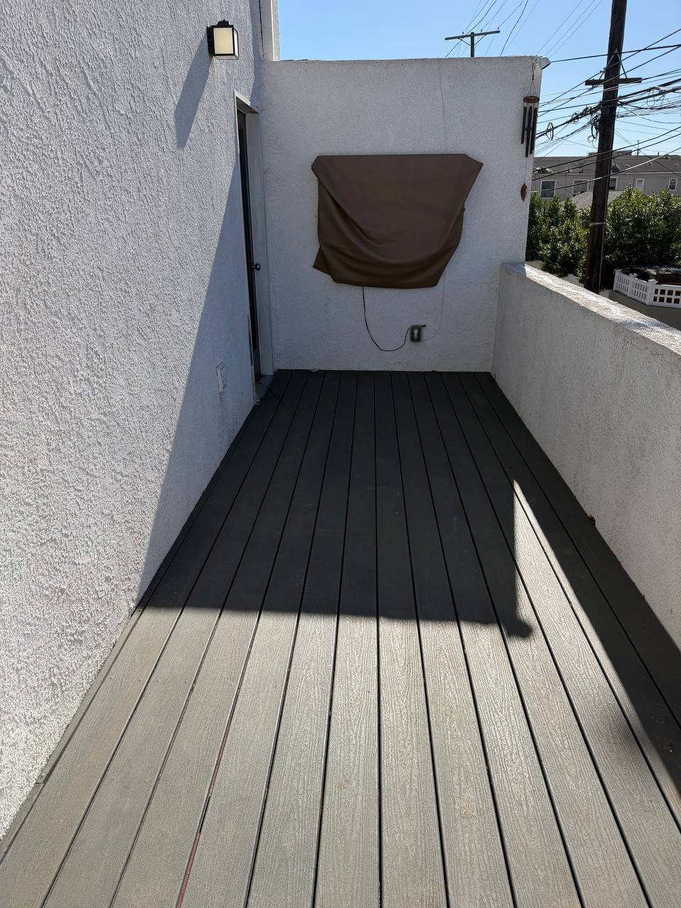 Composite deck installation completed on rooftop balcony - Flashpoint Builders Los Angeles