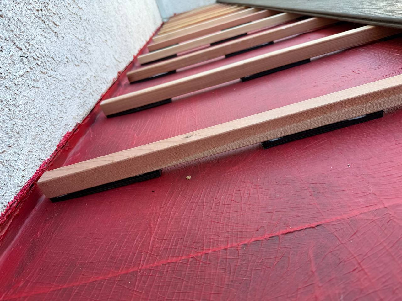 Waterproofing membrane and deck framing - Flashpoint Builders